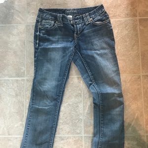 Regular/ straight lighter washed jeans.